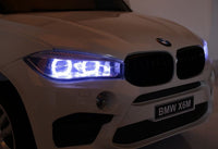Toddler two seat BMW X6 M headlights